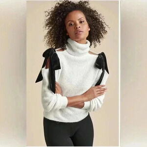 White Sweater with shoulder cut outs with large velvet bows